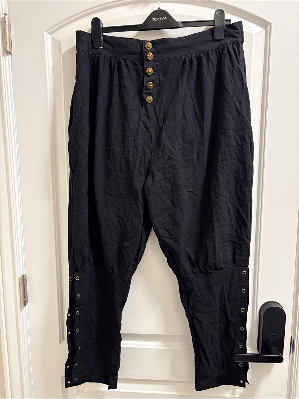 Black Womens Button-Front Eyelet Pants with removable ties on the side